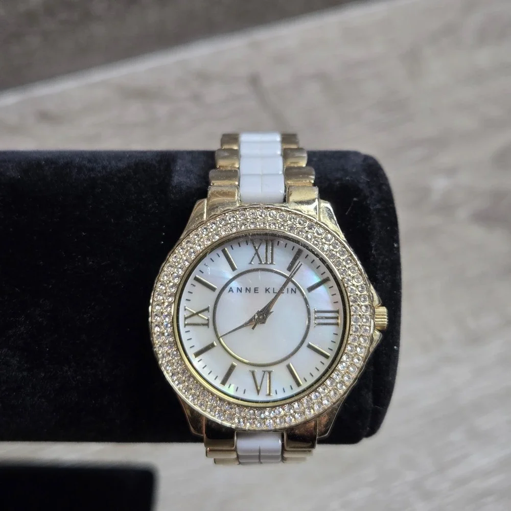 Anne Klein Women's 10/9537MPTTT Mother of Pearl Dial White?Gold Tone Band Watch